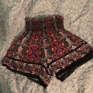 Red paisley shorts.